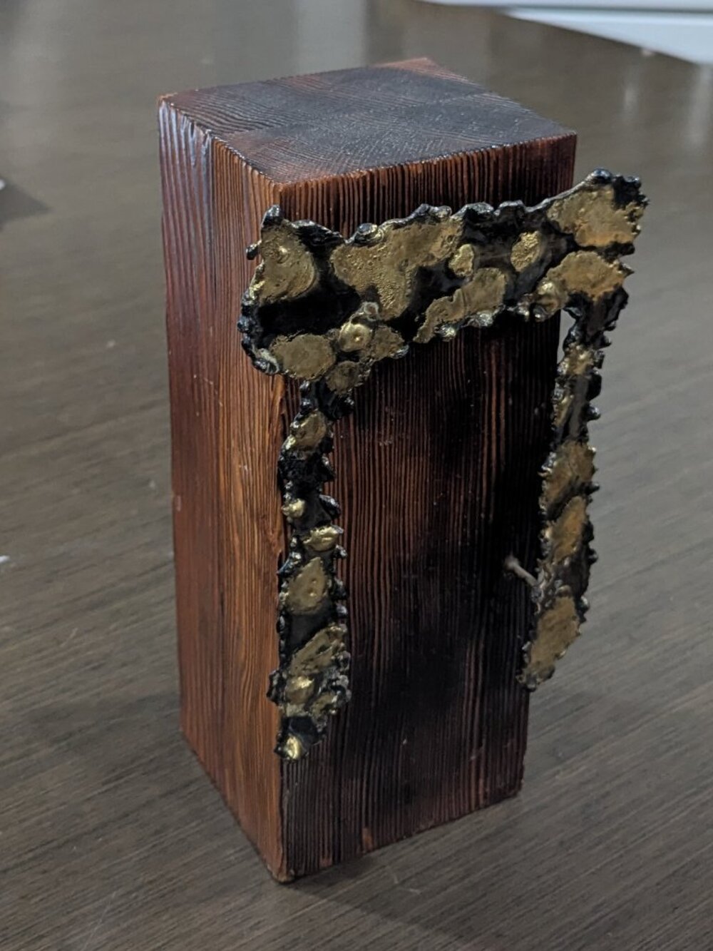 Brutalist-Style Hebrew Letter "Chet" (brass), nailed to wooden pillar